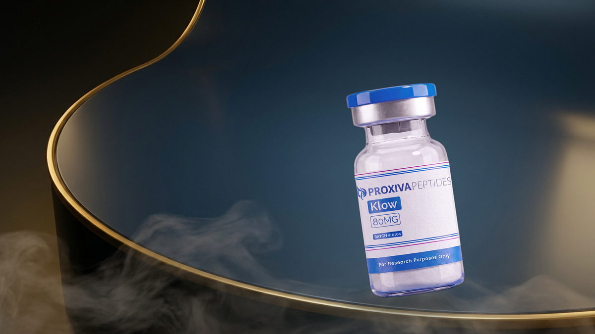 KLOW 80mg blend research vial with blue cap under laboratory lighting